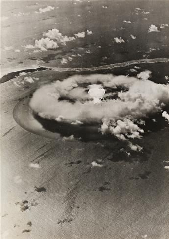(ATOMIC BOMB TESTING--BIKINI ATOLL) A group of 8 photographs depicting the 1946 Operation Crossroads detonation.